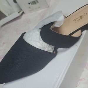 Elegant Black Women's Mules by [Brand]